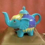 Théière éléphant turquoise et dorée à l'or fin . 230 x 160